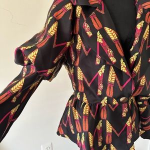 Top, classy and colorful, never worn but sleeves were altered, looks great